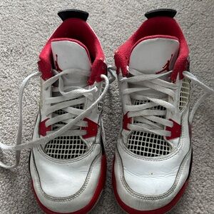 Air Jordan’s 
Nike Kids Red and White Sneakers